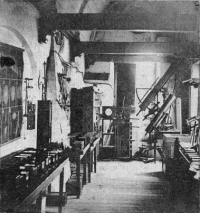 Photo of the old observatory in the academy building, we can see various instruments including the van der Wall.